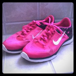 pink NIKE tennis shoes light weight